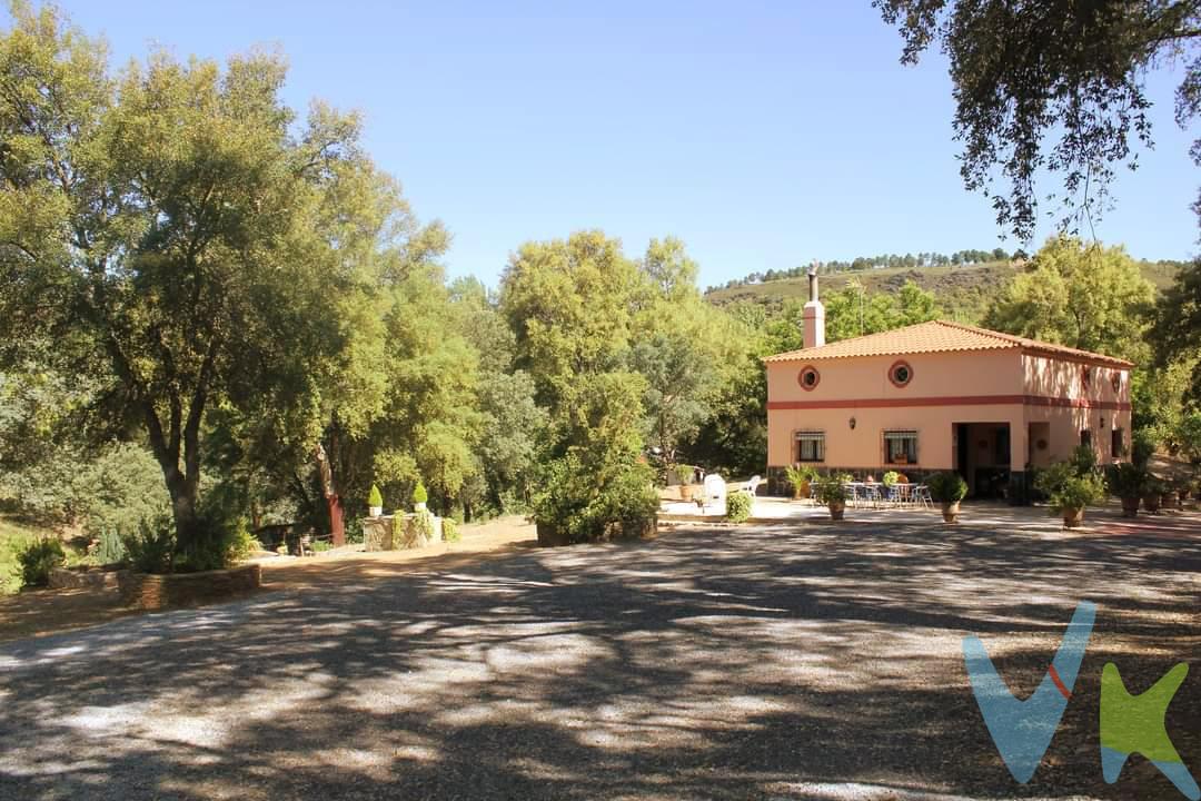 Finca Rústica con Encanto Histórico en Cortelazor, Sierra de Aracena - Una Joya Natural para Vivir o Invertir

Si buscas un refugio único en plena naturaleza, lejos del bullicio urbano, esta finca en Cortelazor, en la idílica Sierra de Aracena, es todo lo que necesitas. Con una extensión de 12.843 m², esta propiedad no solo te ofrece una vivienda histórica y edificaciones legales y en escritura, sino un estilo de vida tranquilo en un entorno natural protegido.

Características destacadas:
•	Vivienda principal de 2 plantas: Con 3 habitaciones, un baño, chimenea, buhardilla con cubierta inclinada a cuatro aguas a la que se accede por una escalera exterior, este acogedor hogar está listo para recibirte. Puedes imaginar despertar en muchos lugares con vistas a la Sierra, disfrutando del aire puro y el silencio de la naturaleza, pero aquí sólo estarás tú y la Sierra, nadie más.

•	Nave multiusos: Ideal para eventos sociales, celebraciones o como apartamento independiente para invitados. Esta construcción versátil de 65 m2 puede adaptarse a tus necesidades.

•	Casa Monte con más de un siglo de antigüedad: Una joya histórica de 28 m2, restaurada y mantenida en perfecto estado, que añade un toque de tradición y autenticidad a la finca.

•	Gallinero y cuatro cobertizos. Preparada para una auténtica vida de campo con estilo y distinción.

•	Piscina y alberca de riego: Una alberca de riego que, además de cumplir su función agrícola, se convierte en una excelente piscina para disfrutar durante los calurosos días de verano.

•	Zonas delimitadas para diferentes actividades: Con huertos, pasto para ganado, y explotación de alcornoques y castaños, la finca ofrece diversas posibilidades productivas, perfectas para quien busque rentabilidad o simplemente amor por la tierra.

•	Accesibilidad y privacidad: Con acceso directo desde la carretera y un camino privado asfaltado que te lleva hasta la entrada principal, la finca garantiza privacidad sin renunciar a la comodidad.

Construcción:
Con una superficie total de 251 m², construida en 1999 en el corazón del Parque Natural Sierra de Aracena y Picos de Aroche, esta finca representa un lujo que pocos pueden permitirse. El entorno natural, los paisajes y la serenidad de la zona hacen que la calidad de vida aquí no tenga precio.

Una oportunidad única para retomar una actividad rural con alta rentabilidad.

¿Es español o extranjero y necesita financiación para poder comprarla? Le ayudamos a conseguirla con las mejores condiciones del mercado. 

¿Busca una casa de campo pero su estilo es otro? Contacte con nosotros, seguro que tenemos la casa de tus sueños en Huelva, Sevilla, Cádiz y el resto de Andalucía. 

Tenemos más de 20 años ayudando a personas a comprar o vender sus propiedades. 

Informamos a nuestros clientes que el precio de venta no incluye lo siguiente: Honorarios de la agencia inmobiliaria, impuestos (el Impuesto de Transmisiones Patrimoniales, IVA o AJD, en su caso), otros gastos de la compraventa (gastos de registro de la Propiedad, Notaría, gestión ni de posible financiación). Documento DIA a disposición del consumidor según Decreto 218/2005 Junta de Andalucía. IMG
