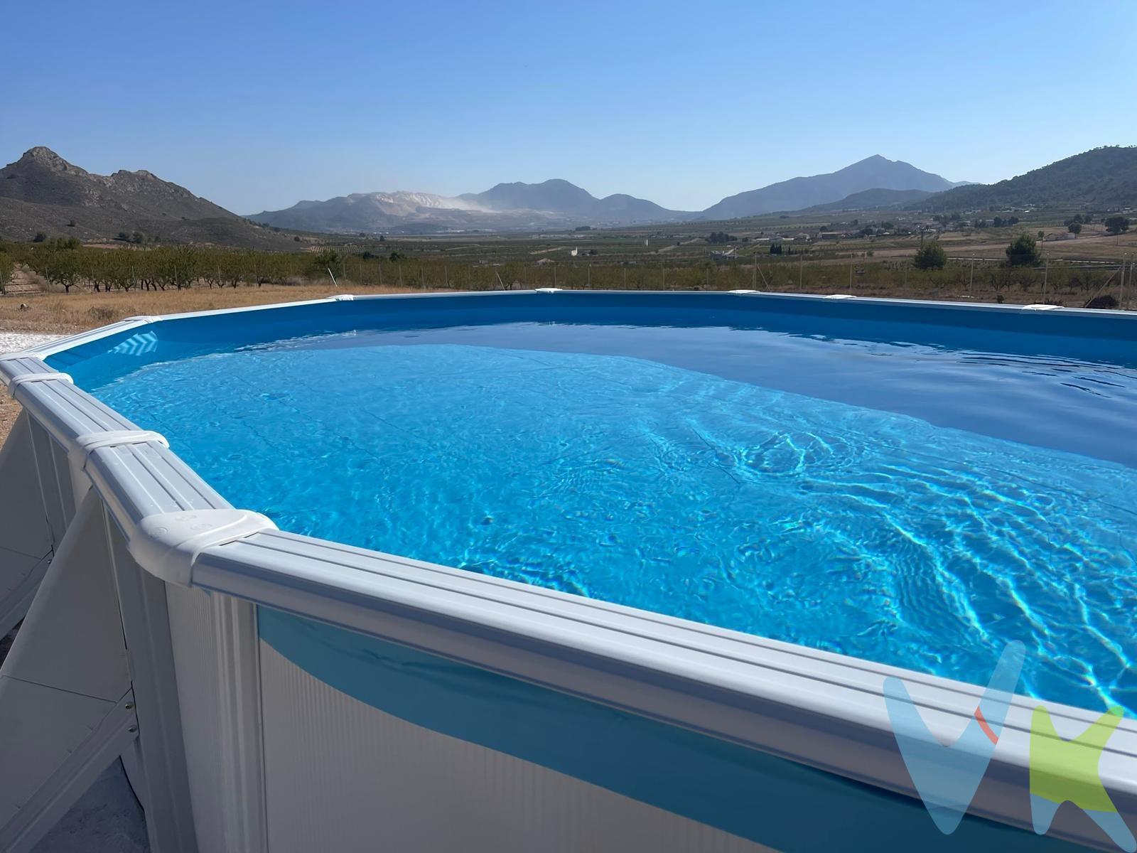 Crea el hogar de segunda residencia que siempre has soñado en esta Casa rural (casa de aperos) y parcela de 5025 m² en venta integrada en la bonita pedanía de  Cañada de la Leña Abanilla Murcia totalmente nueva con 8 placas solares, piscina, depósito de agua de 12.000 litros, y el bonito entorno que le rodea. Tiene dos alturas y orientación Norte y Sur, proporcionando una agradable temperatura en verano y en invierno gracias a su estufa de pelet y doble acristalamiento de la vivienda. La planta baja dispone de Salón, recibidor, cocina equipada con electrodomésticos , armarios, baño, un agradable porche donde podrás disfrutar de unas placenteras tarde de relax. En la 1ª planta localizamos 1 dormitorio con armario,  y con acceso a terraza donde podrás disfrutar de las bonitas vistas y la tranquilidad del entorno. Además, goza de chimenea de pellet, ventiladores, y una casa totalmente reformada, al ser una vivienda de aperos , no se puede solicitar registro!!!. La parcela está totalmente vallada, la vivienda dispone de alumbrado, agua, y fosa séptica. La propiedad se encuentra en un precioso Valle rodeada de montes frondosos con pinos y parcelas agrícolas, muy bien comunicada por carretera con las poblaciones limítrofes. En un radio de 5 km nos encontramos con dos manantiales naturales, la Fuente del Agarrobo y la Fuente de la Higuera. A 45 km de Murcia, 10 km de Pinoso Alicante y a 20km de los Baños Termales de Fortuna. Cuando te pongas en contacto con nosotros te informaremos de los gastos que no están incluidos en el precio, gastos de compraventa y honorarios de agencia y te ayudaremos para que tu proceso de compra con nosotros se convierta en un. Calma: Estado ideal de tranquilidad que tendrás al comprar tu casa con nosotros. Por último, te vamos a contar una cosa: Los propietarios han confiado en nosotros y nos han contratado en exclusiva para que les ayudemos a vender uno de sus bienes más preciados, su casa, su hogar. Esto para ti, como comprador, será una garantía ya que tendrás acceso a un servicio de calidad, un trato fácil, sencillo y sin interferencias de terceros. Por eso, te vamos a pedir un favor, habla con nosotros, no los molestes, te vamos a ayudar en caso de interés en todo el proceso y te vamos a facilitar toda la documentación e información que precises. Como ya te habíamos dicho, ¡Un servicio de calidad!.